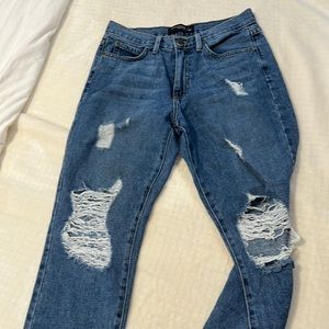 Distressed straight cut jeans